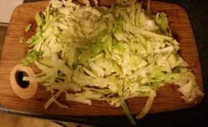 chopped cabbage on a cutting board