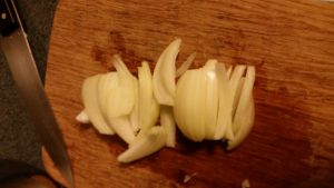 chopped onions on a cutting board