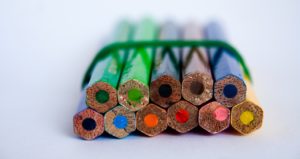 colored pencils wrapped in a rubber band