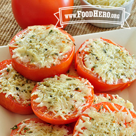 plate of baked tomatoes with cheese