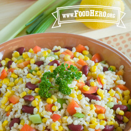 serving bowl of barley, bean and corn salad