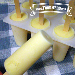 popsicle molds filled with yogurt popsicles