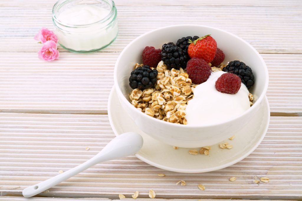 healthy bowl of oatmeal topped with fresh fruit