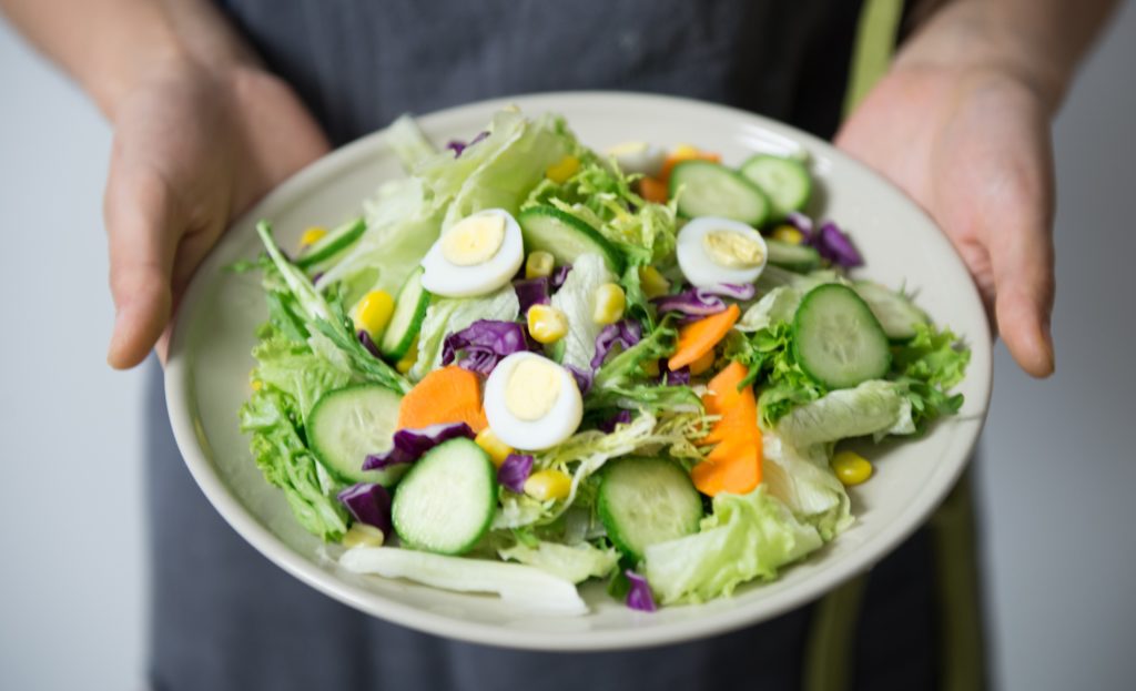 salad with seasonal greens, veggies and hard boiled eggs
