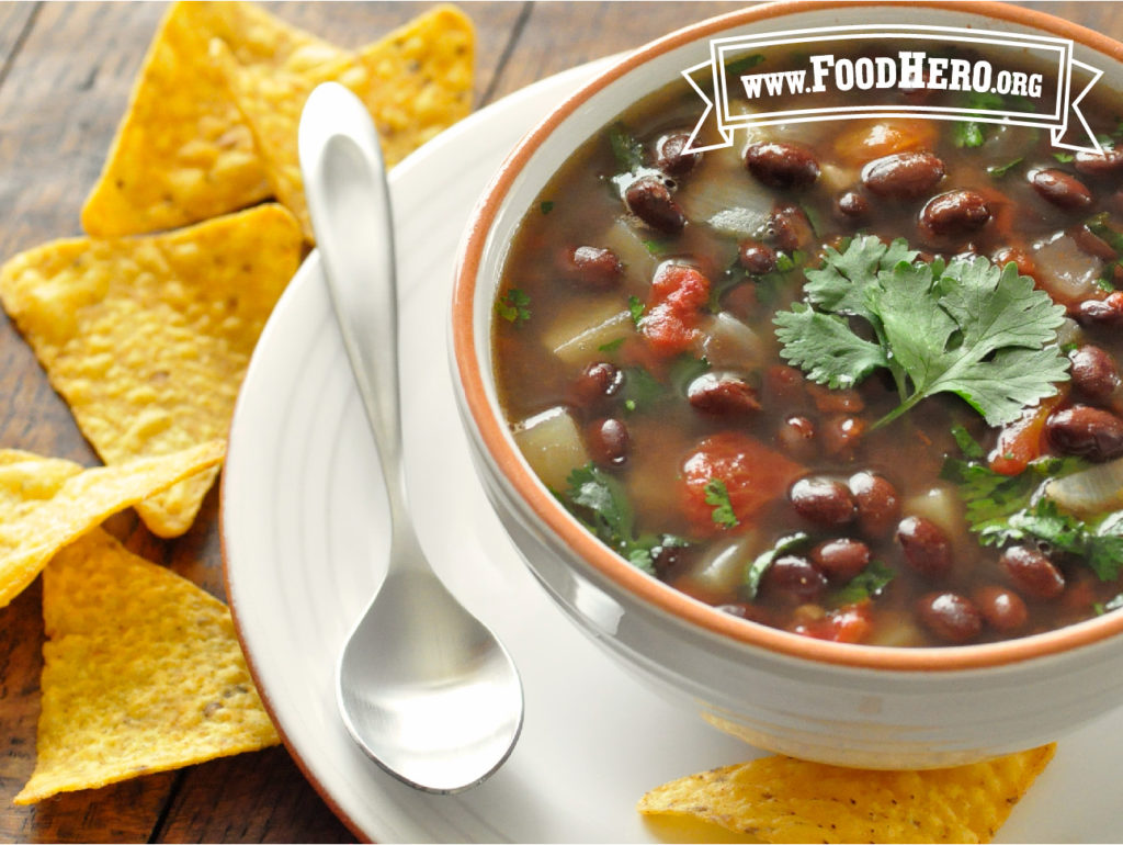 bowl of black bean soup with tortilla chips