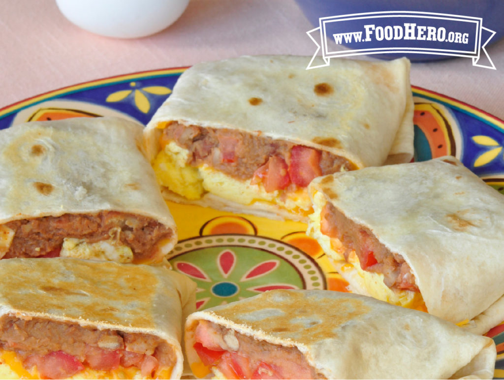 plate of cut individual breakfast burritos