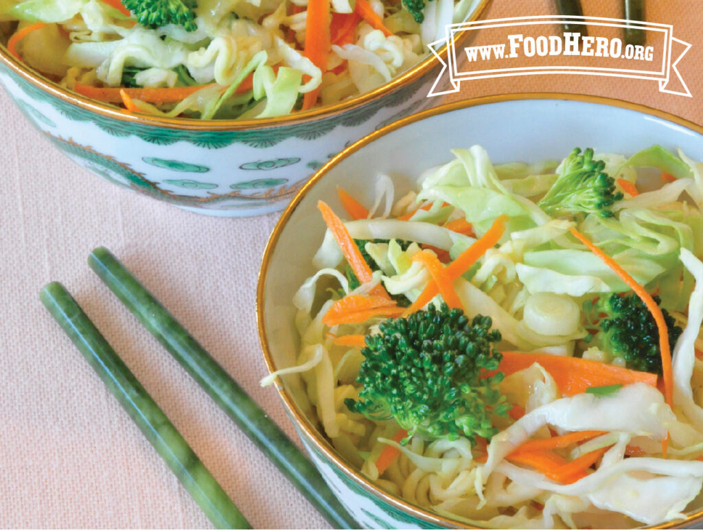 2 bowls of ramen cabbage salad with chopsticks