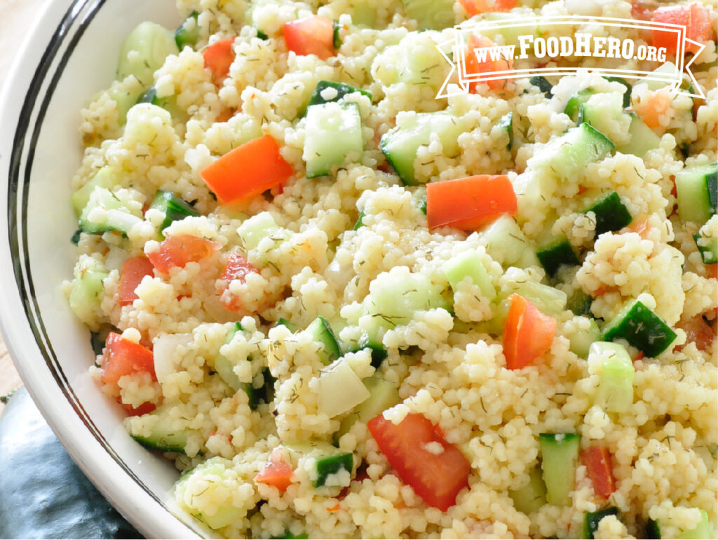 bowl of cucumber salad with tomatoes