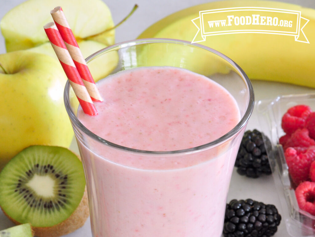 glass of fruit smoothie with milk