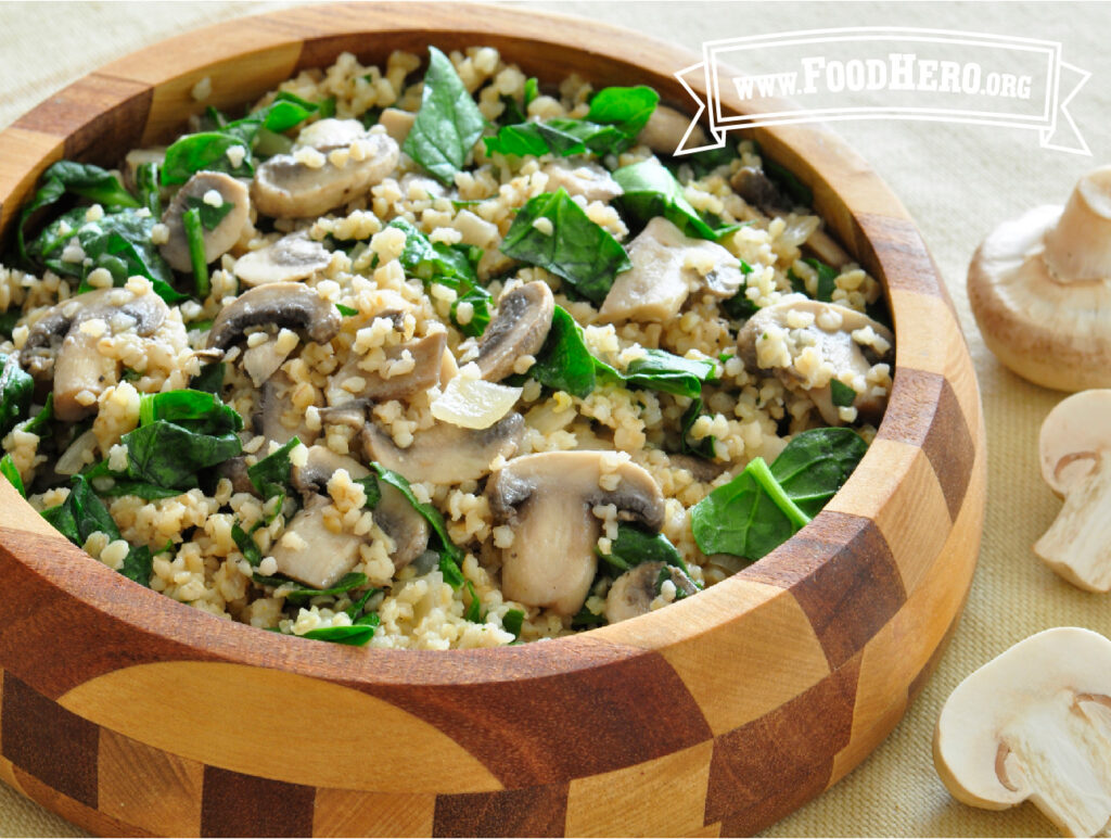 wooden bowl of mushroom bulgur pilaf