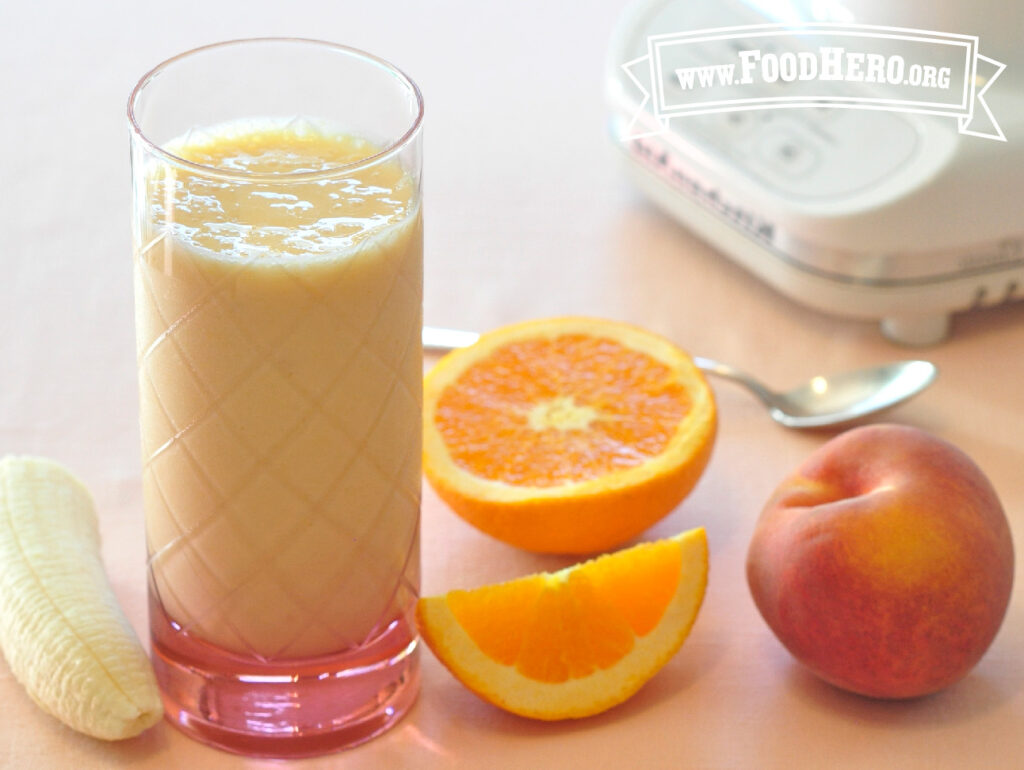 glass of peach yogurt smoothie