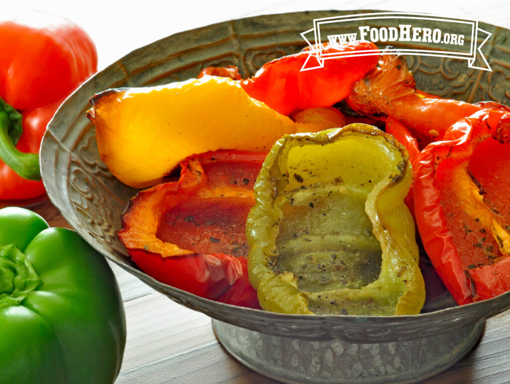 bowl of roasted red, green, and yellow bell peppers