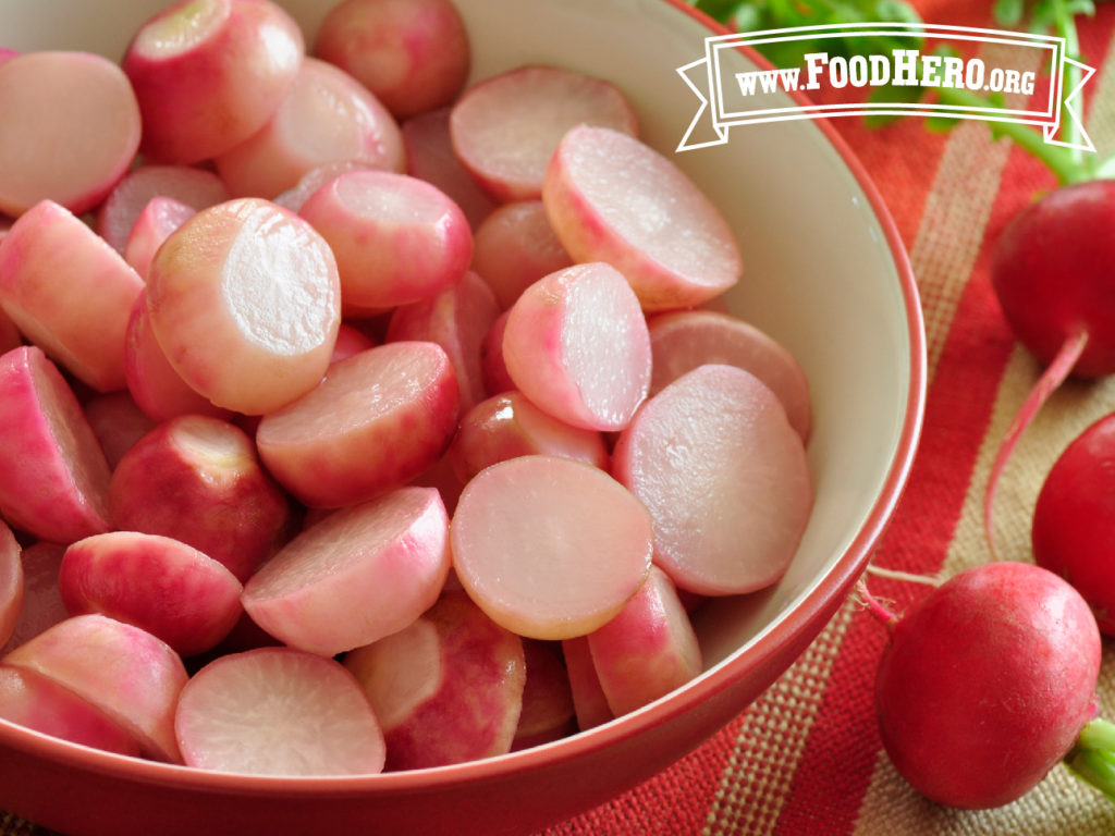 bowl of tender sweet radishes next to 3 fresh radishes