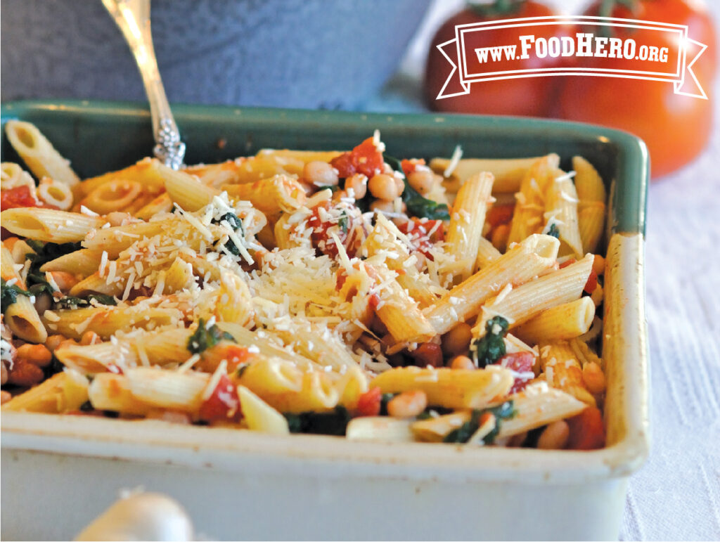 dish of pasta with greens and beans