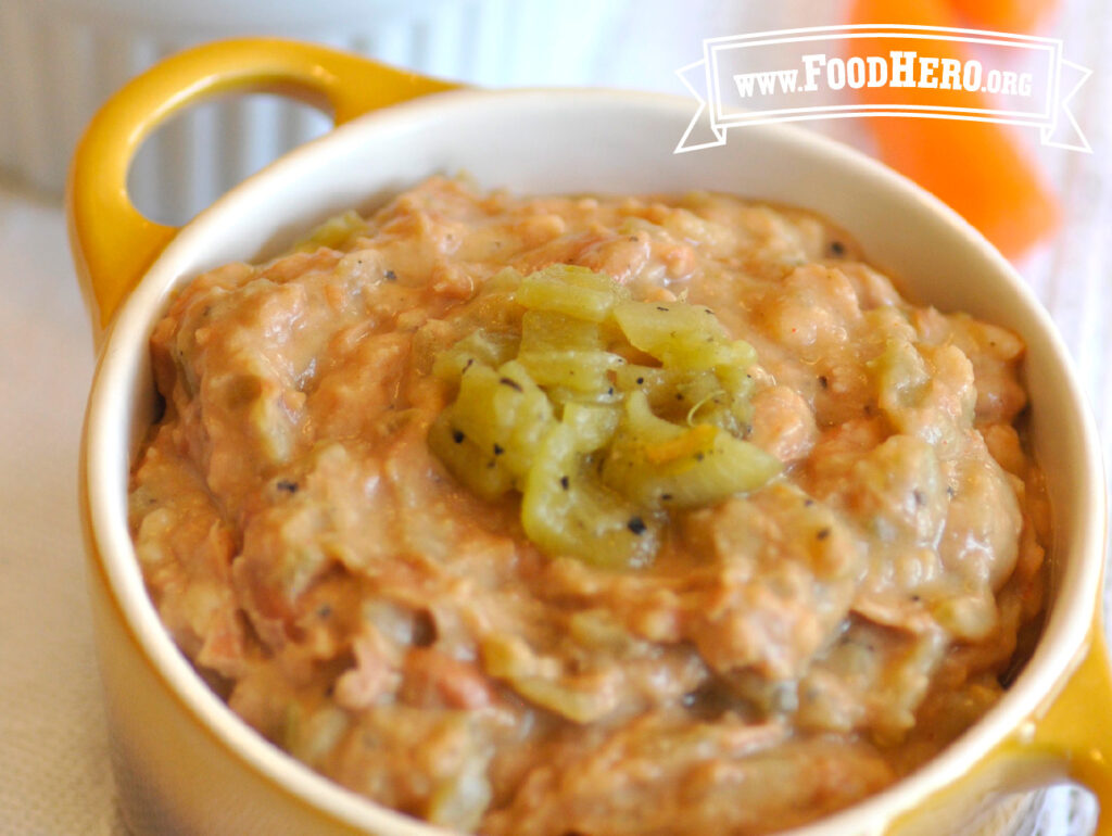 yellow dish filled with smokey pinto bean dip