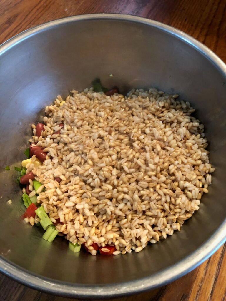 silver mixing bowl containing ingredients