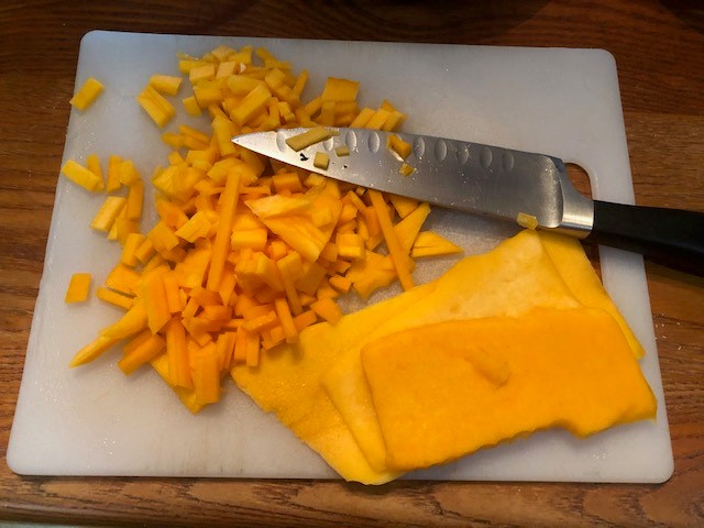 cut butternut squash on cutting board