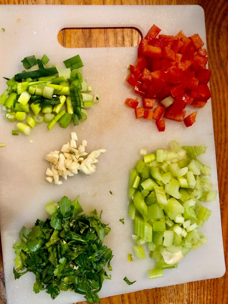 cutting board of chopped vegetables