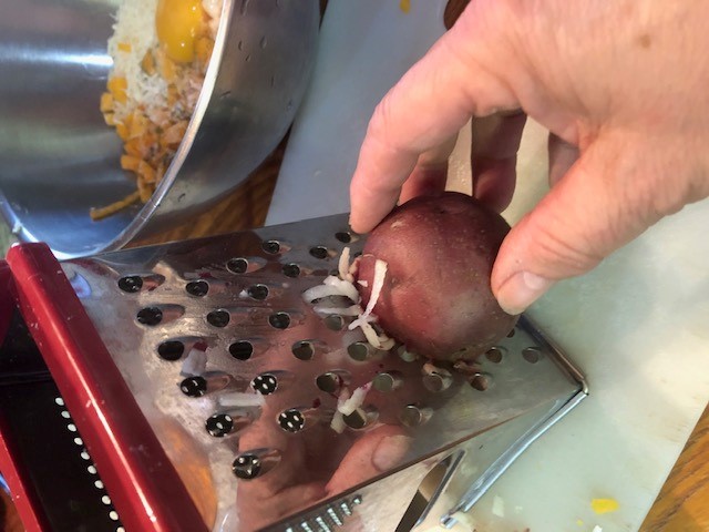 grating a potato