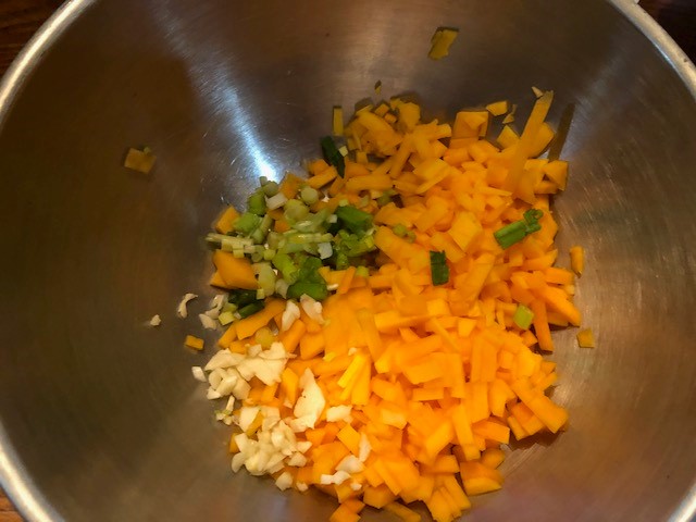 cut butternut squash in a bowl